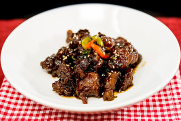 wok fried pork stir fry with sweet peppers and chinese vegetables