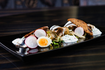 Sprat salad with eggs