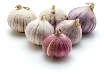 Solo garlic folded in triangle isolated on white background single clove pearl.