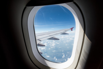 Fototapeta premium Airplane window on the sky