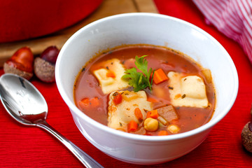 Ravioli Soup in a White Bowl 