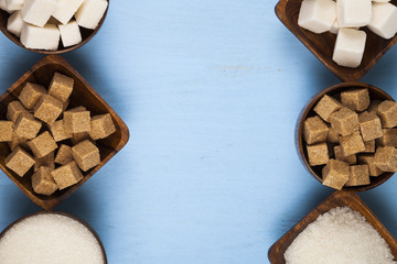 Six bowls of sugar, top view