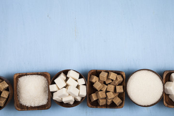 Six bowls of sugar, top view