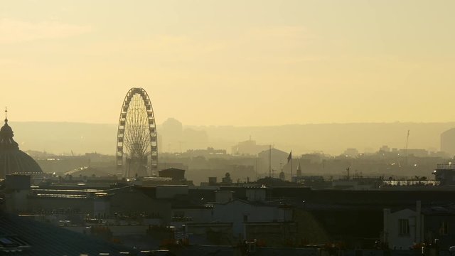 sunset paris city famous galeries lafayette rooftop cityscape ferris wheel panorama 4k france

