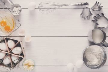 Baking ingredients on rustic white background