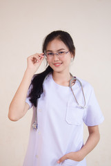 young female doctor standing and smile