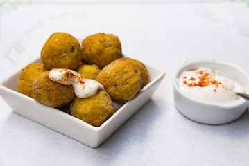 Carrot croquettes with spices and sauce