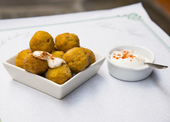 Carrot croquettes with spices and sauce