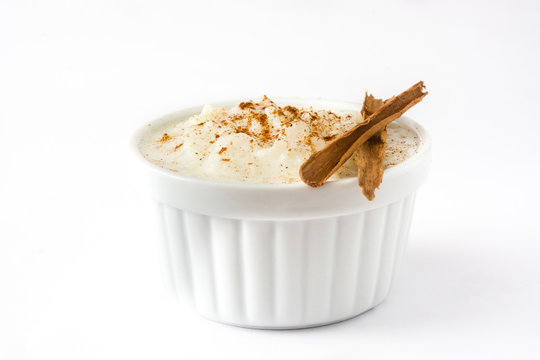 Arroz con leche. Rice pudding with cinnamon isolated on white background