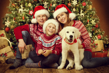 Fototapeta na wymiar Christmas Family with Dog, Happy Father Mother Child Portrait under Xmas Tree