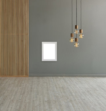 grey wall white frame decorative lamp and paravane