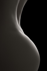 Naklejka premium Profile of nude woman body - Close-up black and white