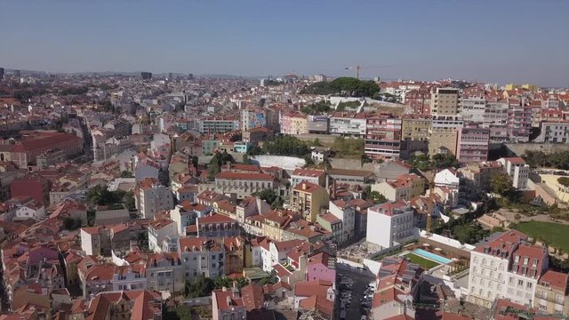 day time lisbon cityscape alfama quarter rooftops aerial panorama 4k portugal
