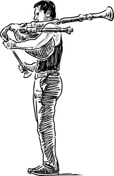Street musician plays a bagpipe