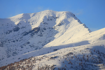 Fototapeta na wymiar mountains with snow in autumn