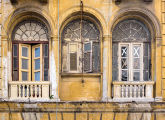Worn out colorful windows in Havana, Cuba