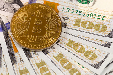 bitcoin and hundred dollars banknotes