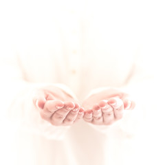 Empty cupped woman hands on white background