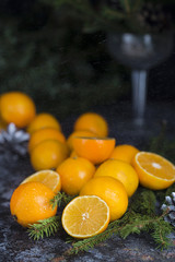 Fresh tangerine clementine on background wooden