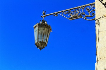 Fototapeta na wymiar Old Lantern in the street under blue sky