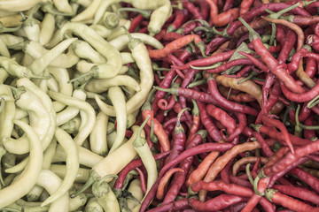 green and red peppers as a background