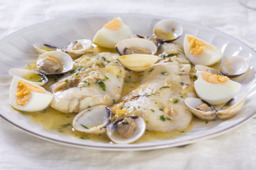 Hake with clams and eggs - obrazy, fototapety, plakaty