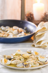 Hake with clams and eggs
