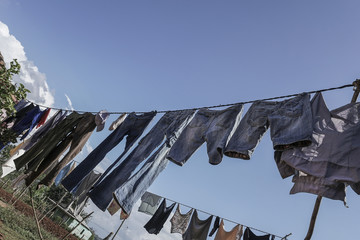Hanged clothes on rope at garden to dry