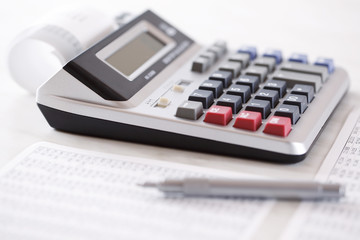 Close up of cash register  with bills and copy space