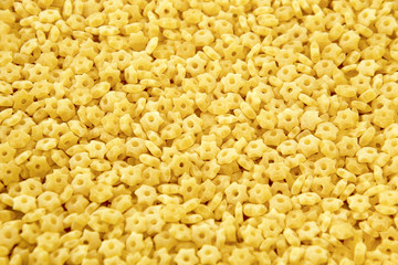 Macaroni stars. A seamless food texture.