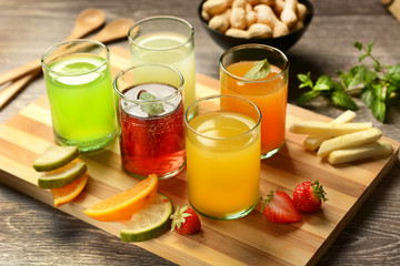 assorted fruit juices with ingredients around