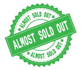 ALMOST SOLD OUT green text round stamp, with zig zag border.
