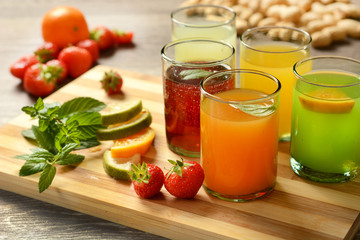 assorted fruit juices with ingredients around