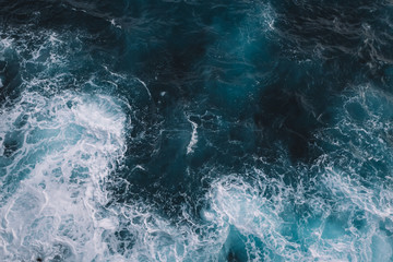 Aerial view to ocean waves. Blue water background - 180761805