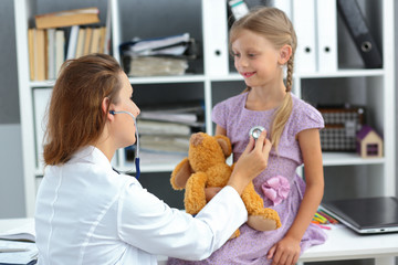A child receiving a doctor at a hospital in a hospital