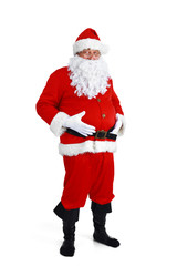 Real Santa Claus carrying big bag full of gifts, isolated on white background