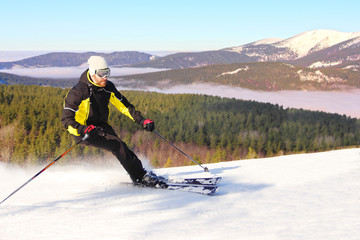 Skier in morning mountains