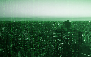 Tokyo City of light building with computer coding texture for technology concept