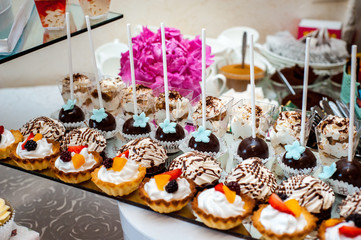 Delicious wedding reception candy bar dessert table