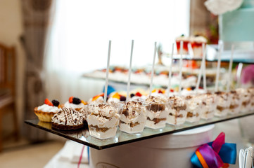 Delicious wedding reception candy bar dessert table