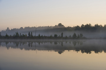Morning fog on a Quiet Lake