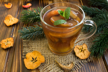 Traditional compote of dried fruits for Christmas on the rustic background