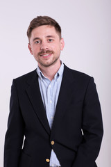 Businessman portrait on a young background smile