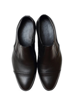 black men's leather shoes on white background