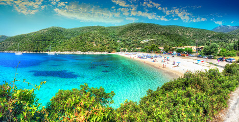 Panorama of the sea water and Mikros Poros Gialos beach in summer holiday, Lefkada island, Greece