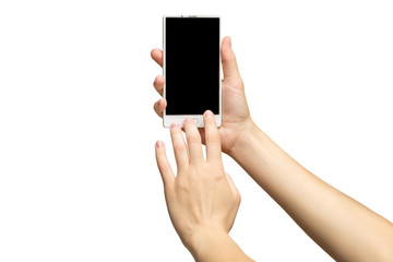 Mockup of female hands holding modern white cellphone with black screen and making sliding gesture isolated at white background.