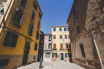 Fototapeta premium Old retro street without anyone in Italy Venice in summer