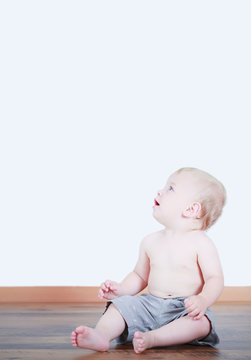 one year old baby looking up