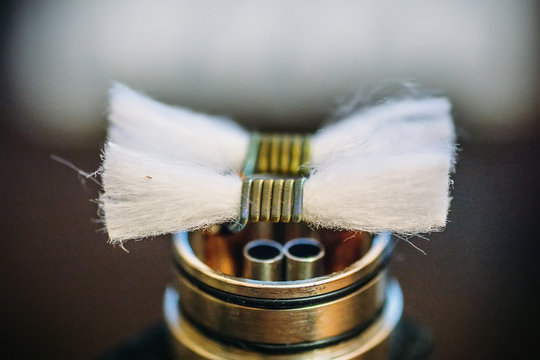 Vape RDA or e-cigarette for vaping with coils and cotton, rebuildable dripping atomizer or vaporizer. Smoke e-liquid or vapour