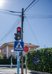 color on the traffic light with a beautiful blue sky in background.